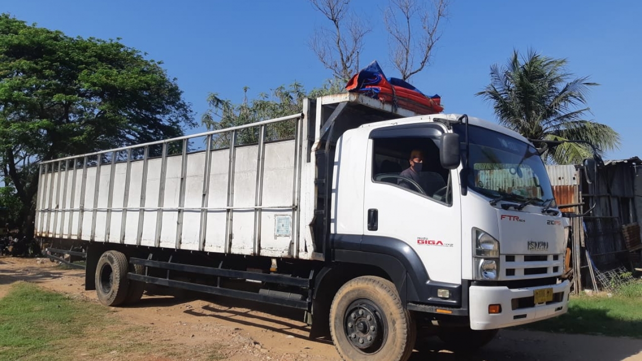 Jasa angkutan truk kargo darat dan kontainer Gresik – Surabaya