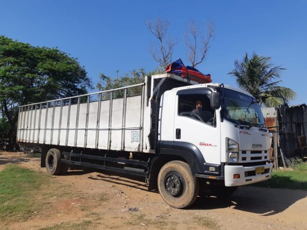 Jasa angkutan truk kargo darat dan kontainer Gresik – Surabaya
